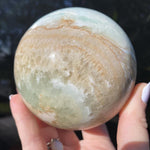 Load image into Gallery viewer, Caribbean Calcite Sphere - Ruby's Minerals