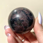 Load image into Gallery viewer, Eudialyte in Arfvedsonite Sphere - Ruby&#39;s Minerals
