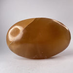 Load image into Gallery viewer, Honey Calcite Palmstone - Ruby&#39;s Minerals
