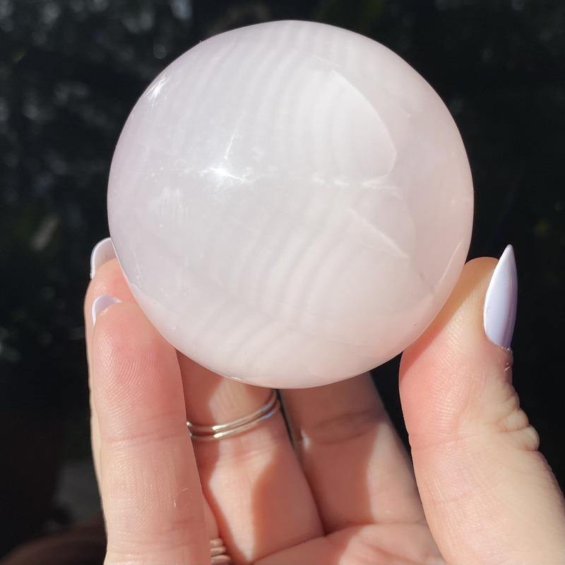 Mangano Calcite Sphere - Ruby's Minerals