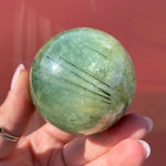 Load image into Gallery viewer, Tourmalinated Prehnite Sphere

