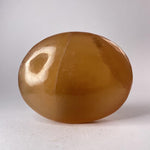 Load image into Gallery viewer, Honey Calcite Palmstone - Ruby&#39;s Minerals
