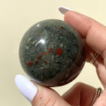 Load image into Gallery viewer, Bloodstone Sphere - Ruby&#39;s Minerals
