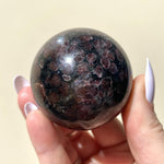 Load image into Gallery viewer, Eudialyte in Arfvedsonite Sphere - Ruby&#39;s Minerals

